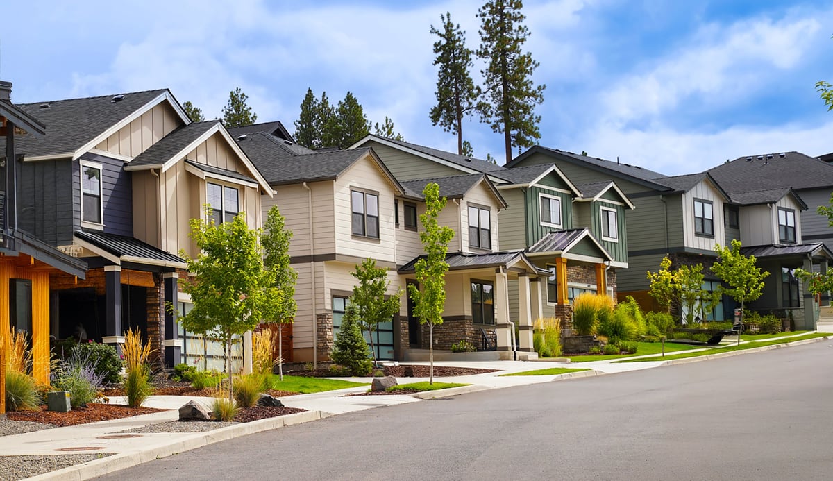 A quiet Mableton residential neighborhood under a clear blue sky